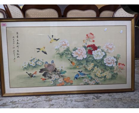 A 20th century Chinese painting on fabric  depicting birds and flowers in a grassy landscape, red seal mark above calligraphy