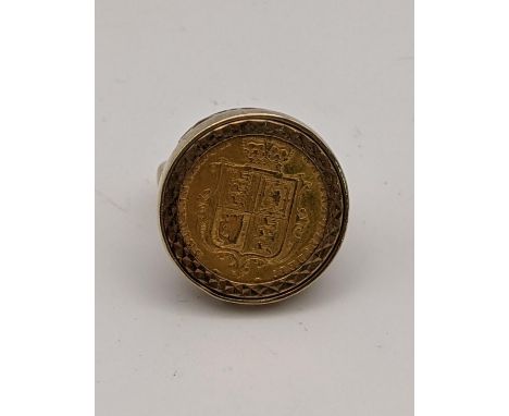 A 9ct gold ring set with a shield back half Sovereign 9.2gLocation: 