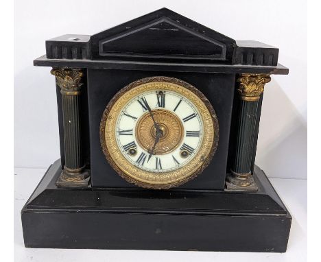 A late Victorian black slate marble 8-day mantel clock of architectural formLocation: 