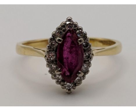 An 18ct gold ring set with a ruby and diamonds 4gLocation: 