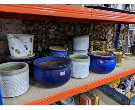 A group of garden pottery planters, a brass coal bucket, and similar planter, and brass scales Location: 