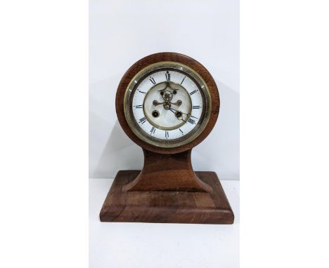 An early 20th century propellor mantel clock having a visible Brocot escapement with Breguet style hands 28.5cm x 23.5cm Loca