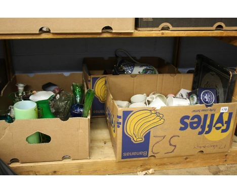 Shelf of assorted mugs and glass ware