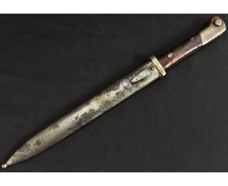 A Polish Mauser bayonet, 24.5cm straight fullered blade marked with eagle, WP, Perkun 85128, two-piece wooden grip, steel sca