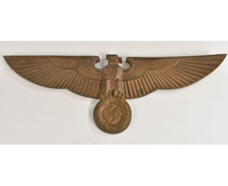 A Third Reich Nazi German alloy architectural mount or emblem, cast as the Hoheitszeichen Adler des Dritten Reiches (eagle an