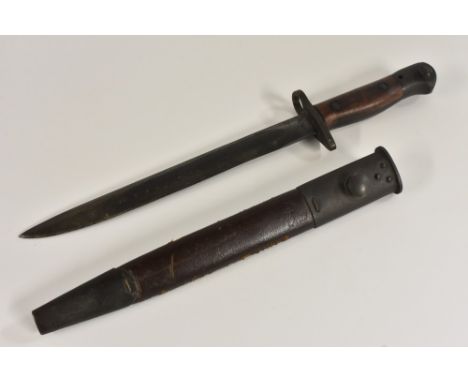 An Australian 1907 pattern bayonet, 25cm straight fullered blade with broad arrow mark, two-piece wooden grip stamped SLAZ51 