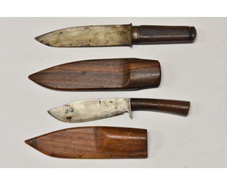 An Indonesian wedung dagger, hardwood scabbard; another, smaller, (2)  