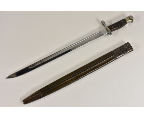 An American 1913 pattern bayonet, by Remington, 43.5cm straight fullered blade, two-piece wooden grip, steel and leather scab