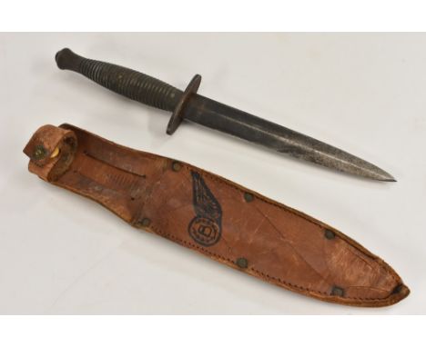 A Fairburn Sykes-type commando fighting knife, 16cm pointed fullered steel blade, rounded cross guard, turned handle, ball po