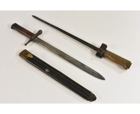 A French Lebel bayonet, 33cm cruciform blade, 45cm long overall, 1886;  a Mauser knife bayonet, 29.5cm blade, C2263, associat