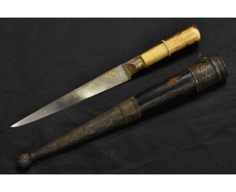 An Indian pesh-kabz dagger, 21cm pointed tapered blade koftgari damascened in the Persian taste, two-piece bone grip, silver 