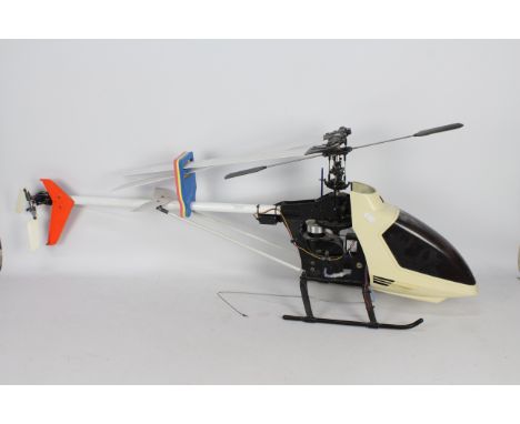 A Hirobo R/C petrol helicopter. Hight 40 cm Length 110 cm approx.  This item appears complete and shows only slight damage to