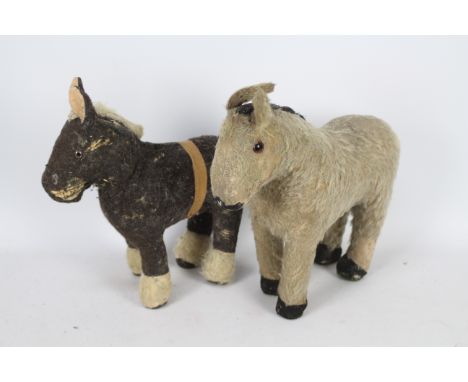 Chiltern, Other Two vintage soft toys including a Chiltern mohair donkey with amber and brown glass eyes, black mane, black t