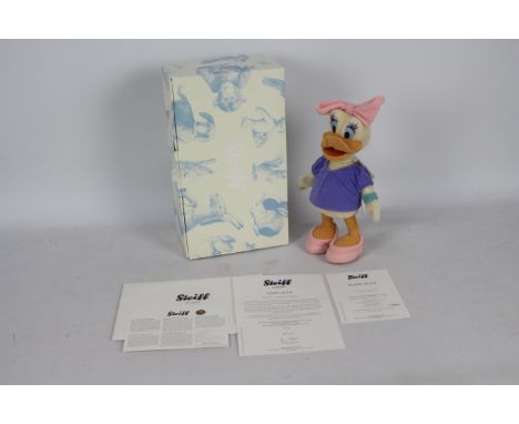 Steiff - A boxed Steiff Disney Limited Edition #354991 'Daisy Duck'. The toy stands 25cm in height and comes with Steiff butt