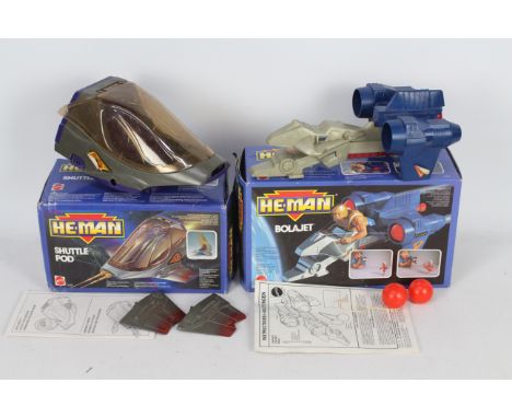 Mattel - He-Man - 2 x boxed 1980s boxed He-Man toys, a Shuttle Pod # 3336 and a Bolajet Vehicle # 3534. They both show signs 
