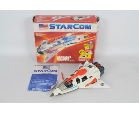 Starcom Starmax Bomber, Pilot Rip Malone, Instructions and box, item appears to be in good condition, the missile on the righ