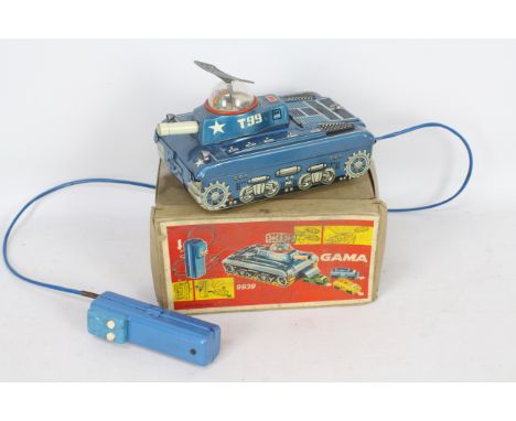 Gama - A boxed battery powered Gama Space Tank T99 # 9939. The blue tank contains three small clockwork tanks inside. There i