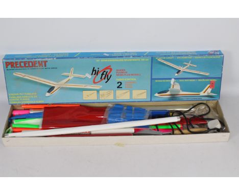 A collection of various colours of wind covering sheets and an electric heat sealing tool. (This does not constitute a guaran