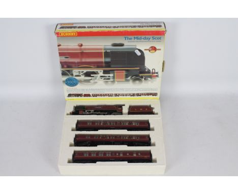 Hornby - a boxed 00 gauge 4-6-2 steam loco set, the Mid Day Scot, with light storage wear. the loco and coaches appear in goo