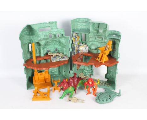 MOTU Castle Greyskull (almost complete, string and a few weapons for the rack are missing) Cards, decals and flag appear to b