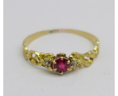 A Victorian ruby and diamond three stone ring, (tests as high carat gold), 1.4g, P 