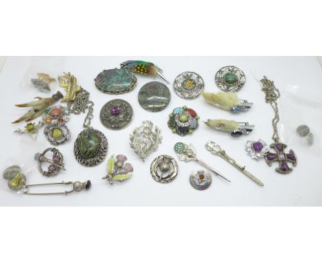 A collection of Celtic style and Scottish brooches 