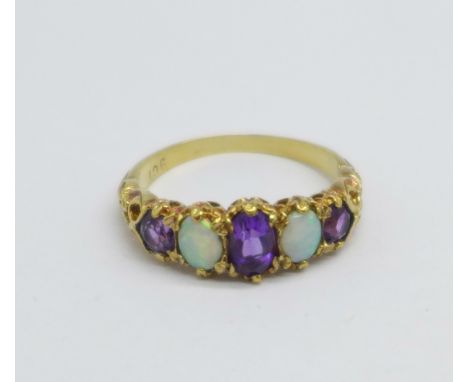 A 9ct gold, five stone amethyst and opal ring, 3.2g, Q 