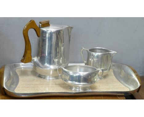 A Piquot Ware three piece tea service with tray 