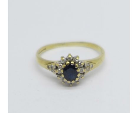 A 9ct gold, diamond and sapphire cluster ring, 1.7g, O 