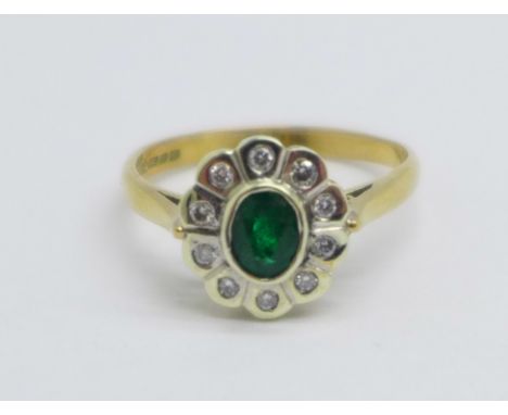 A 9ct gold, emerald and diamond cluster ring, 2.2g, M 