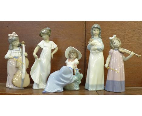 Five Nao figures including Violin and Cello players 