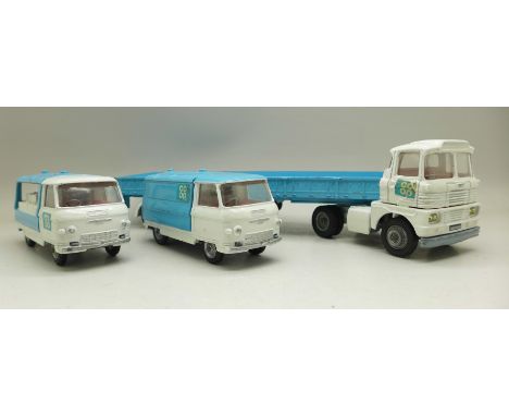 A Corgi Toys Co-operative Society set, Commer van, milk float and flat-bed lorry