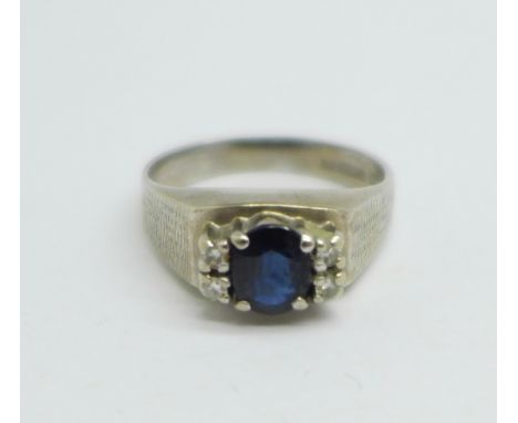 An 18ct white gold, sapphire and diamond ring, 4.7g, N 