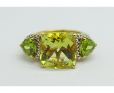 A silver gilt, green quartz and peridot ring with diamond accents, O 