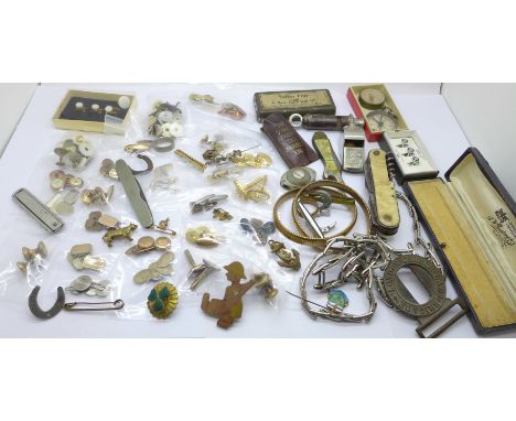 A collection of cufflinks, shirt studs, penknives including Swiss Army, two compasses, an Acme Thunderer whistle, etc. 