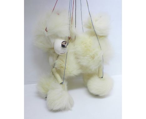 A 1950's/1960's Pelham Puppet, Poodle, boxed 