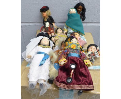 A box of seventeen ceramic costume dolls and other celluloid dolls **PLEASE NOTE THIS LOT IS NOT ELIGIBLE FOR POSTING AND PAC