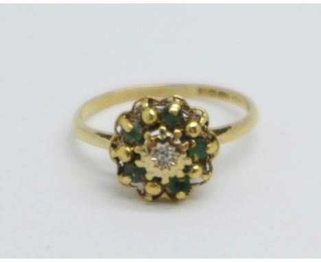 A 9ct gold, emerald and diamond cluster ring, 1.6g, K 