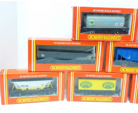 Twelve Hornby Railways 00 gauge model wagons; BP, Shell, Harvester, etc., boxed 