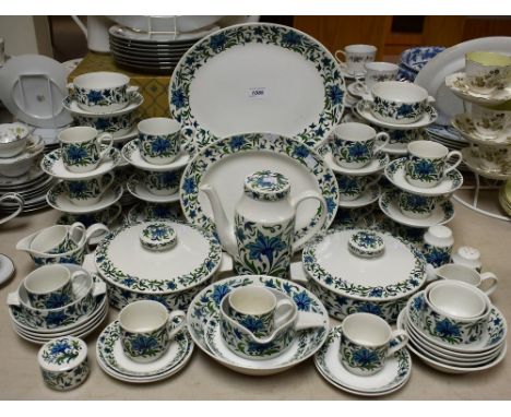 A Midwinter Spanish Garden pattern part dinner and tea service comprising dinner plates, dessert plates, side plates, vegetab