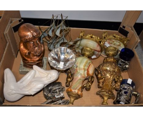 A matched pair of onyx baluster lamp bases, gilded cherub decoration; a brass galleon; a bronzed figure of Zeus on marble bas