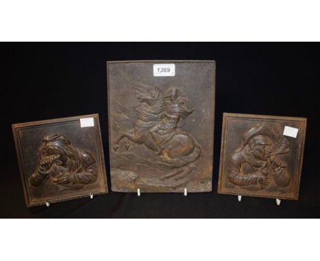 A cast iron plaque, Napoleon Bonaparte; two others, the pipe and the snuff takers (3)