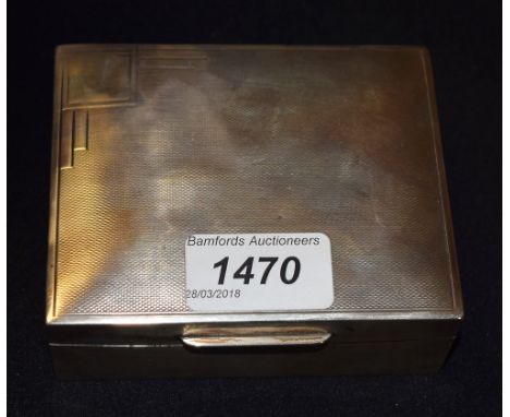 An Art Deco rectangular cigarette box, engine turned, hinged cover, cedar wood lined, 11cm wide, London 1936