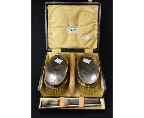 A gentleman's silver brush and comb matched set, hallmarked, cased