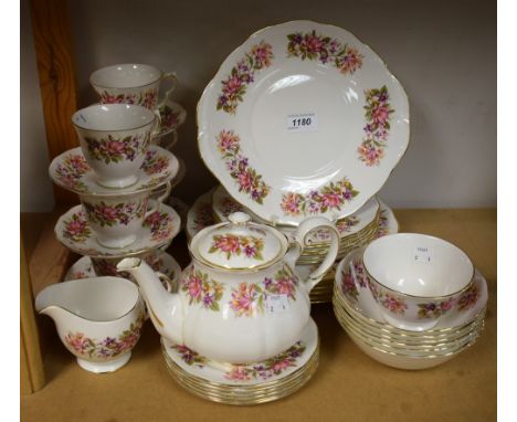 A Colclough Honeysuckle pattern dinner and tea service (*40)