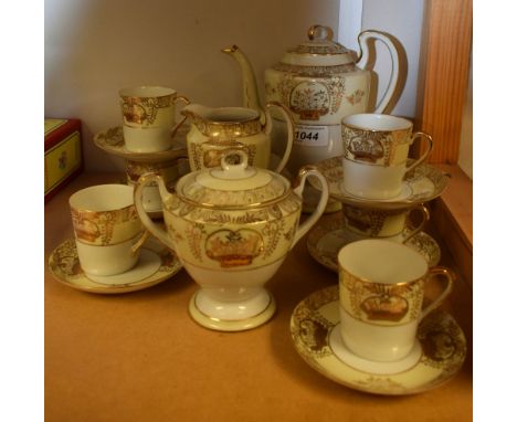 A Noritake type six setting gold banded coffee service, including coffee pot, cups, saucers, cream jug, etc.