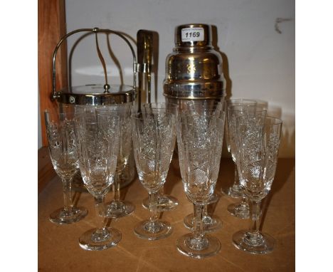 A 1930's plated cocktail shaker with engine turned banding; a cut glass ice bucket with plated handle and cover; cut glass po