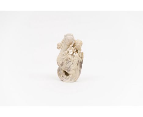 A carved chicken-bone jade phoenix groupChina, Ming dynasty, 17th centuryProvenance: Belgian private collectionHeight: 12cm, 