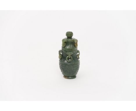 A carved spinach jade vaseChina, Qing dynasty, late 19th centuryProvenance: French private collectionHeight: 13cm, Diameter: 