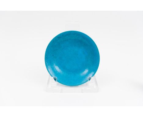 A biscuit turquoise-blue dishChina, Qing dynasty, Kangxi period (1662-1722 )Finely decorated with engraved lotus scrolls.Prov